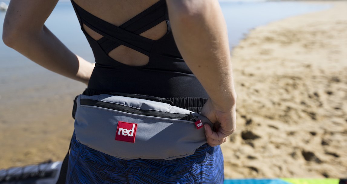 women wearing red originals personal floatation device