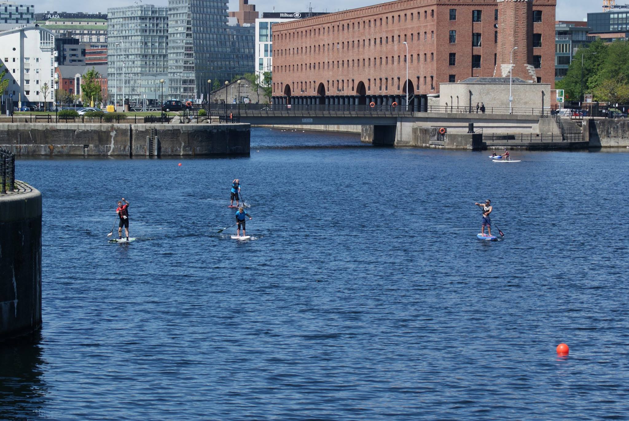 group paddleboarding in Liverpool Port